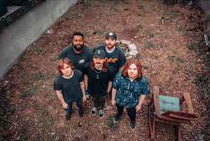 Read more about the article Chicago Pop Punk 5-Piece Wilmette Embrace Nostalgia on New Single + ‘Guitar Hero’-Inspired Video “Circa ’99” Off The Upcoming Debut Full-Length ‘Hyperfocused”