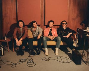 Read more about the article Arctic Monkeys Release New Single “There’d Better Be A Mirrorball”